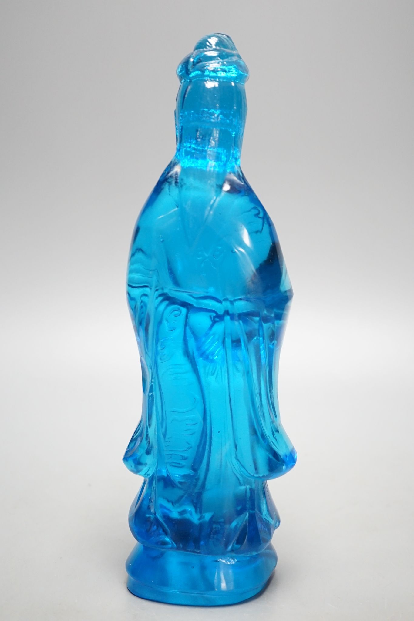 A Chinese blue glass figure of Guanyin 27cm